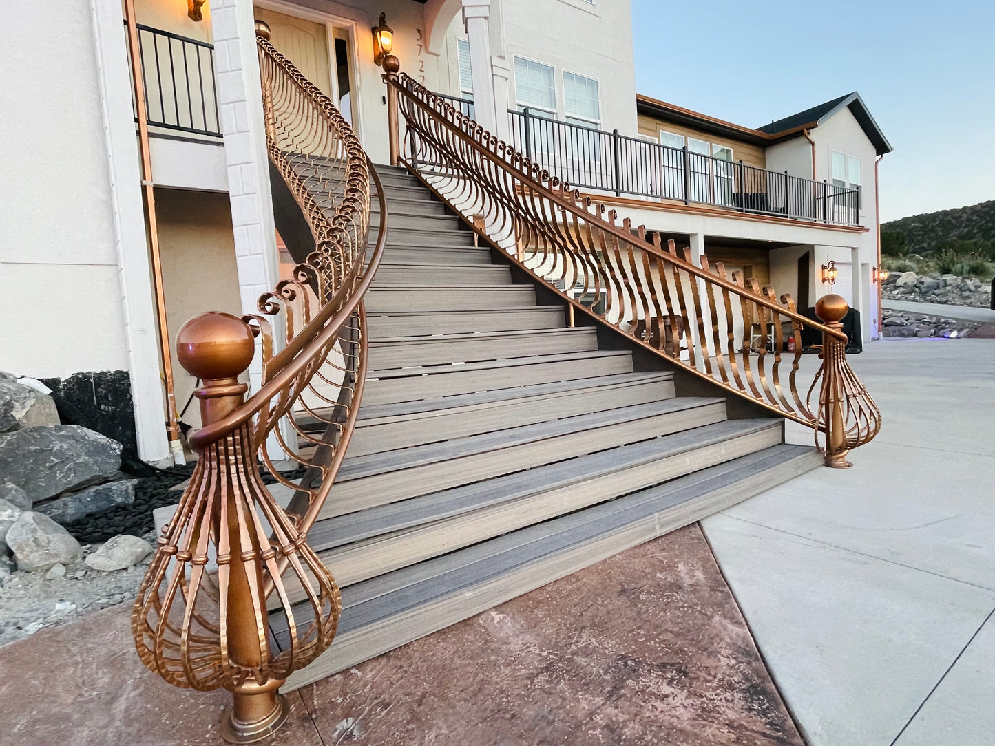 Curved railings, starting at $600/linear ft