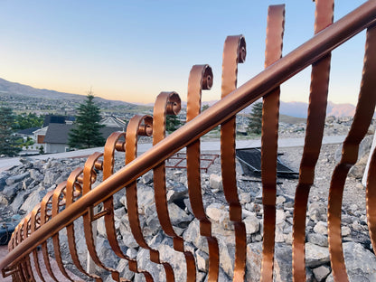 Curved railings, starting at $600/linear ft