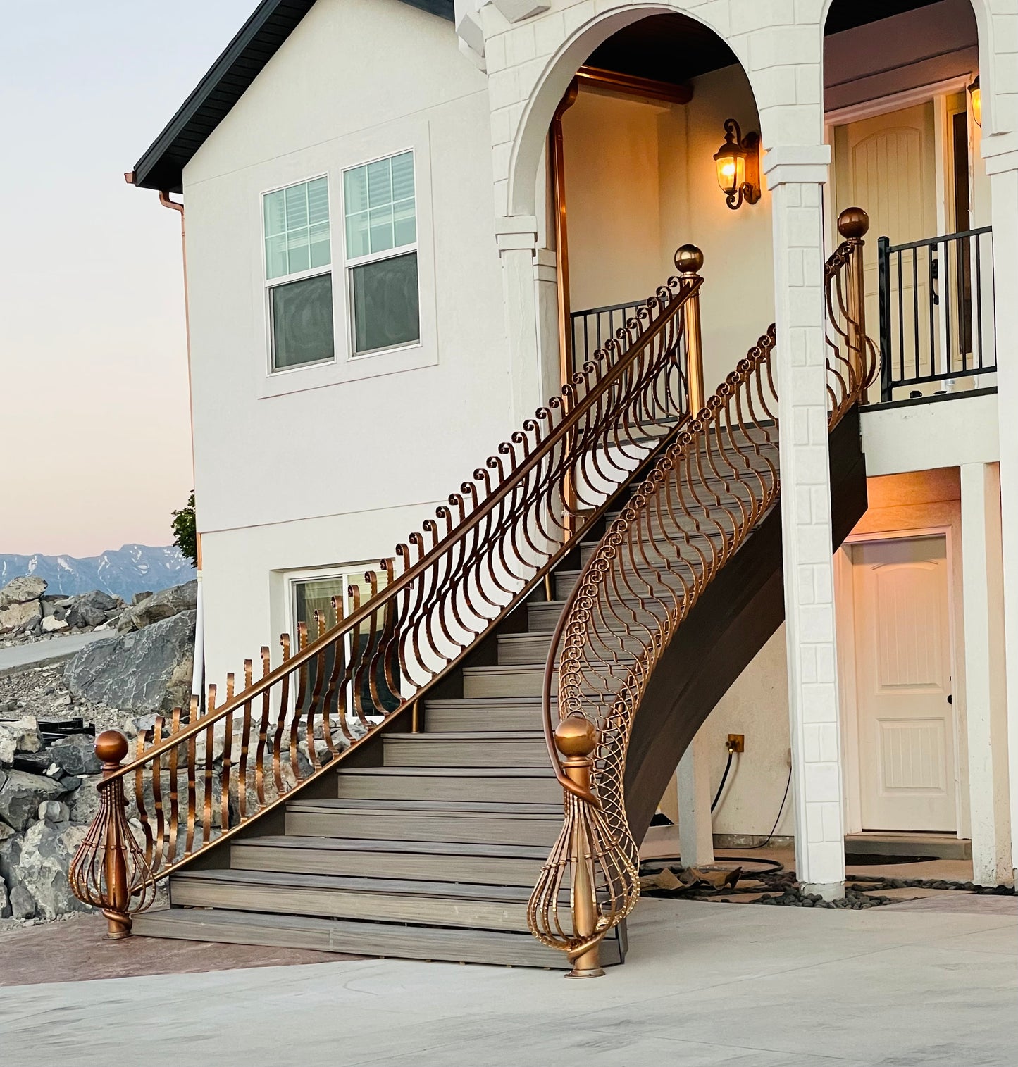 Curved railings, starting at $600/linear ft